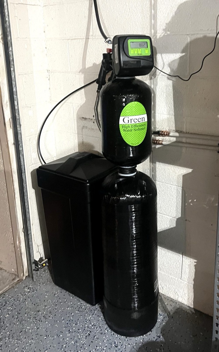 High-efficiency water softener installed in a Phoenix garage